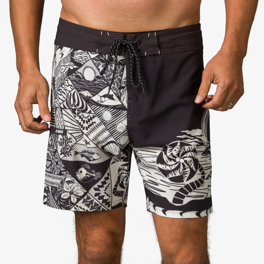 Front view of men's Marshall Boardshort featuring black and white surf-inspired patterns with drawstring waist for comfort.