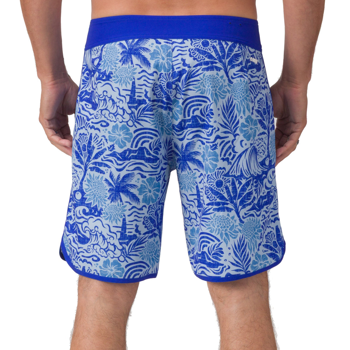 Rear view of men's Fayder Boardshort in blue tropical print, designed for beach comfort and active lifestyles.