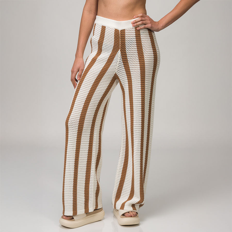 Front view of Mika Sweater Pant in brown and white stripes with soft cushioned beach sandals for women