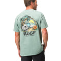 Back view of a man wearing the Akin Tee with a beach skull and palm tree graphic, surf-inspired comfort apparel.