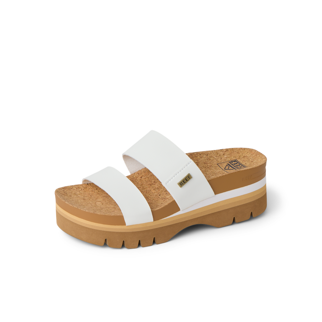 Cushion Vista Higher sandal facing right with white straps, cork footbed, and ridged sole for beach comfort.
