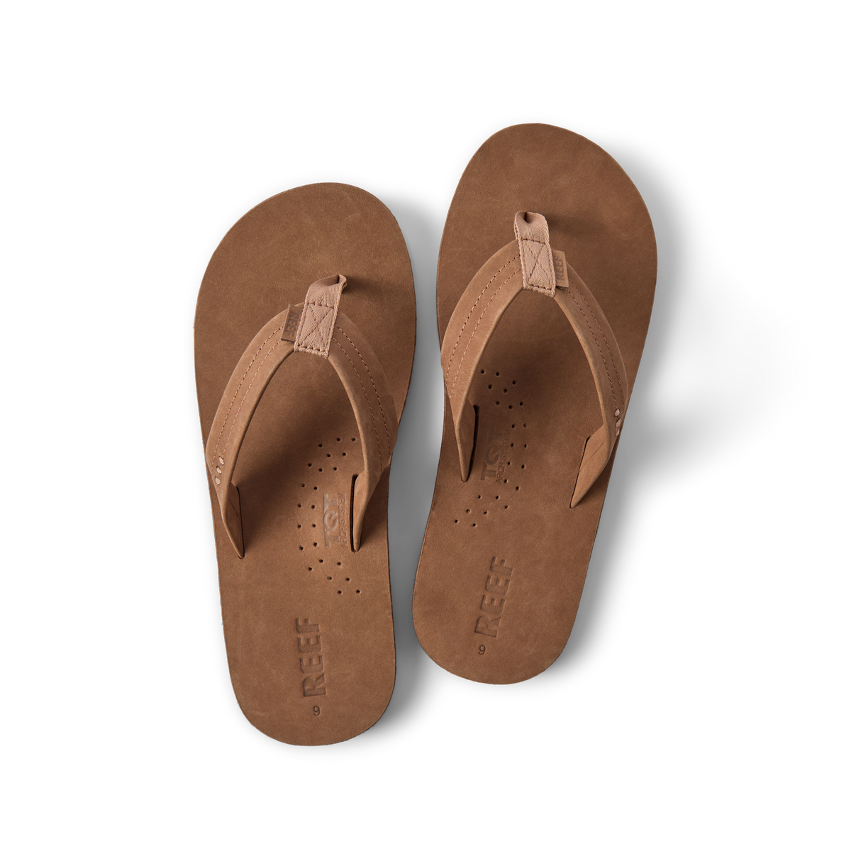 Top view of brown Reef Draftsmen men's sandals featuring soft-rebound cushioning and anatomical arch support designed for all-day comfort.