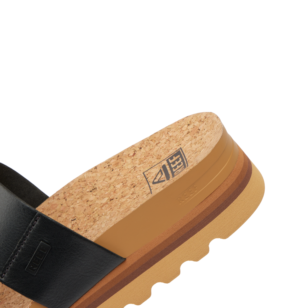 Close-up of the heel and footbed of Cushion Vista Hi facing right, featuring cork, arch support, and soft cushioning.