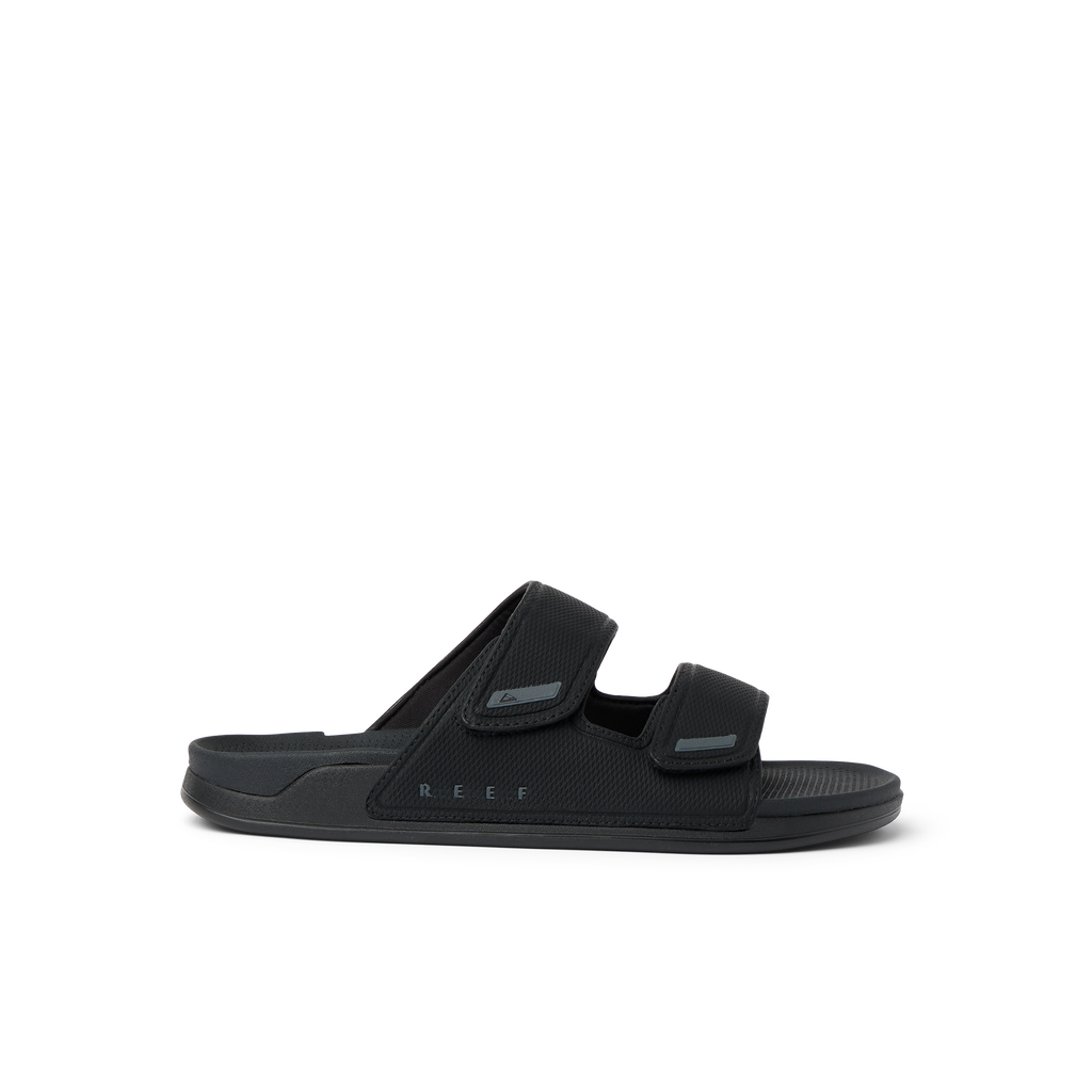 Phantom Tradewind men's black sandal facing right, with adjustable straps and anatomical arch support for comfort
