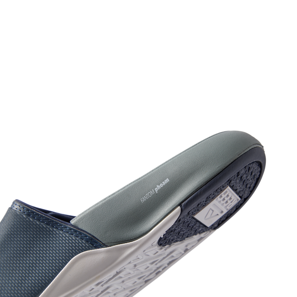 Phantom Slab men's footwear showing right side close-up of cushioned arch support and water-friendly sole design