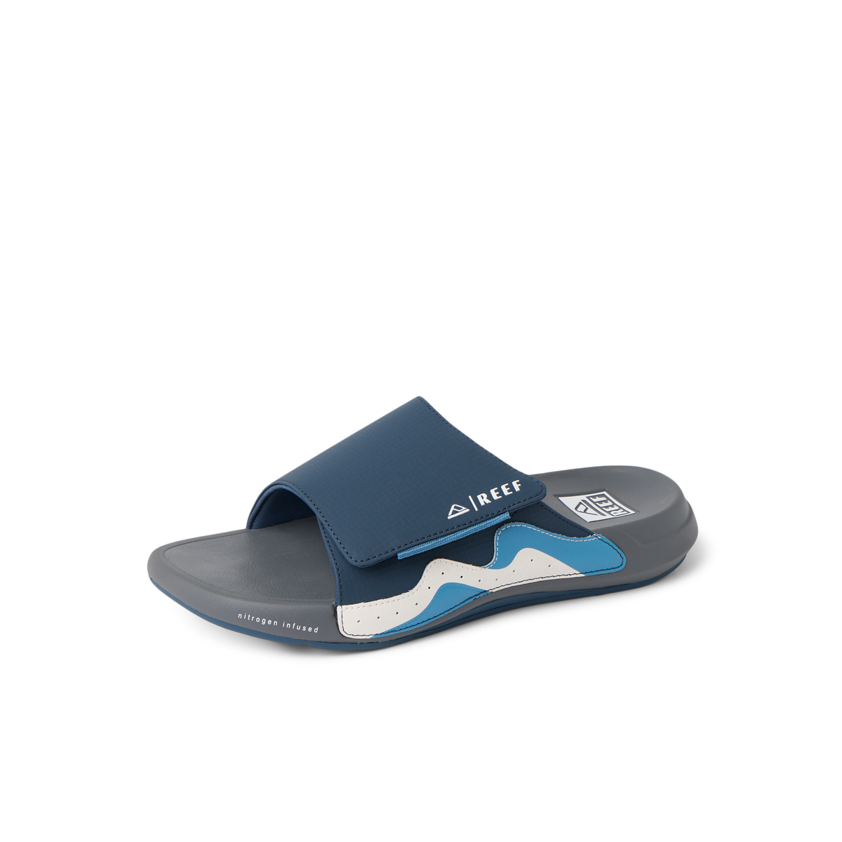Cruiser Slide facing left, navy grey white men's slide sandal with anatomical arch support and cushioned footbed.