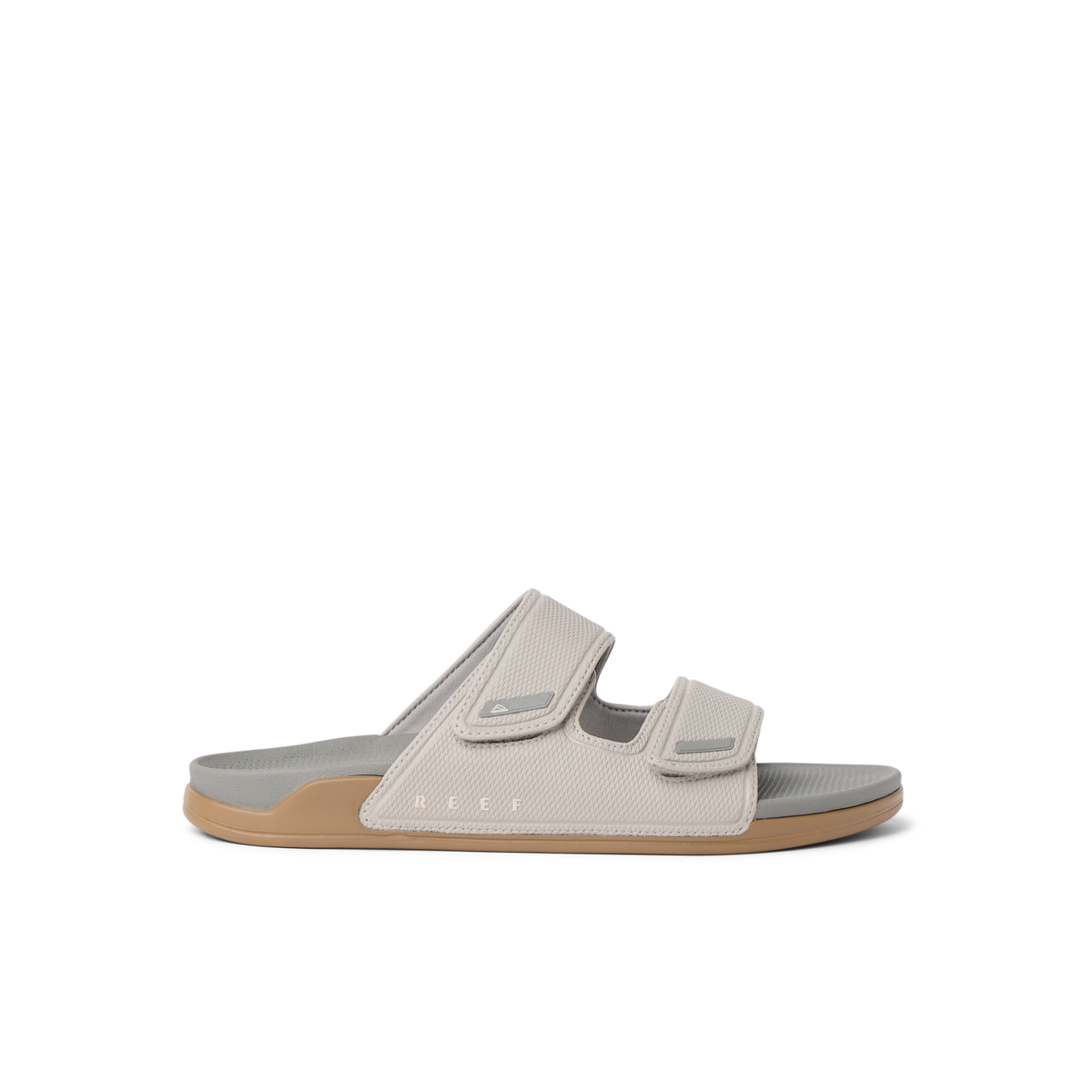 Phantom Tradewind men’s sandal facing right with adjustable straps, soft cushioning, and anatomical arch support for beach comfort.