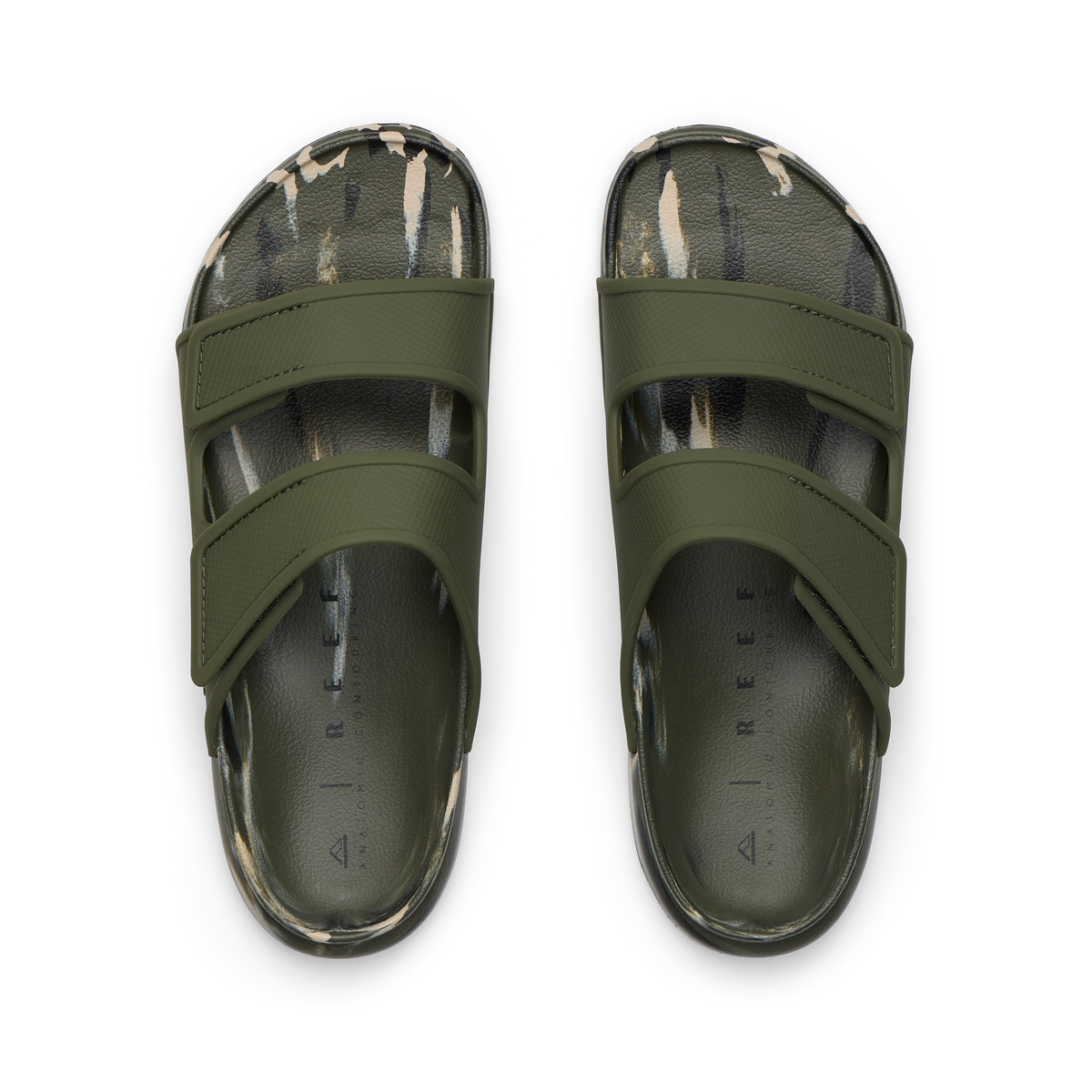Top-down view of men's Oasis Adapt slides in green with camo marble footbeds, featuring anatomical arch support and soft cushioning.