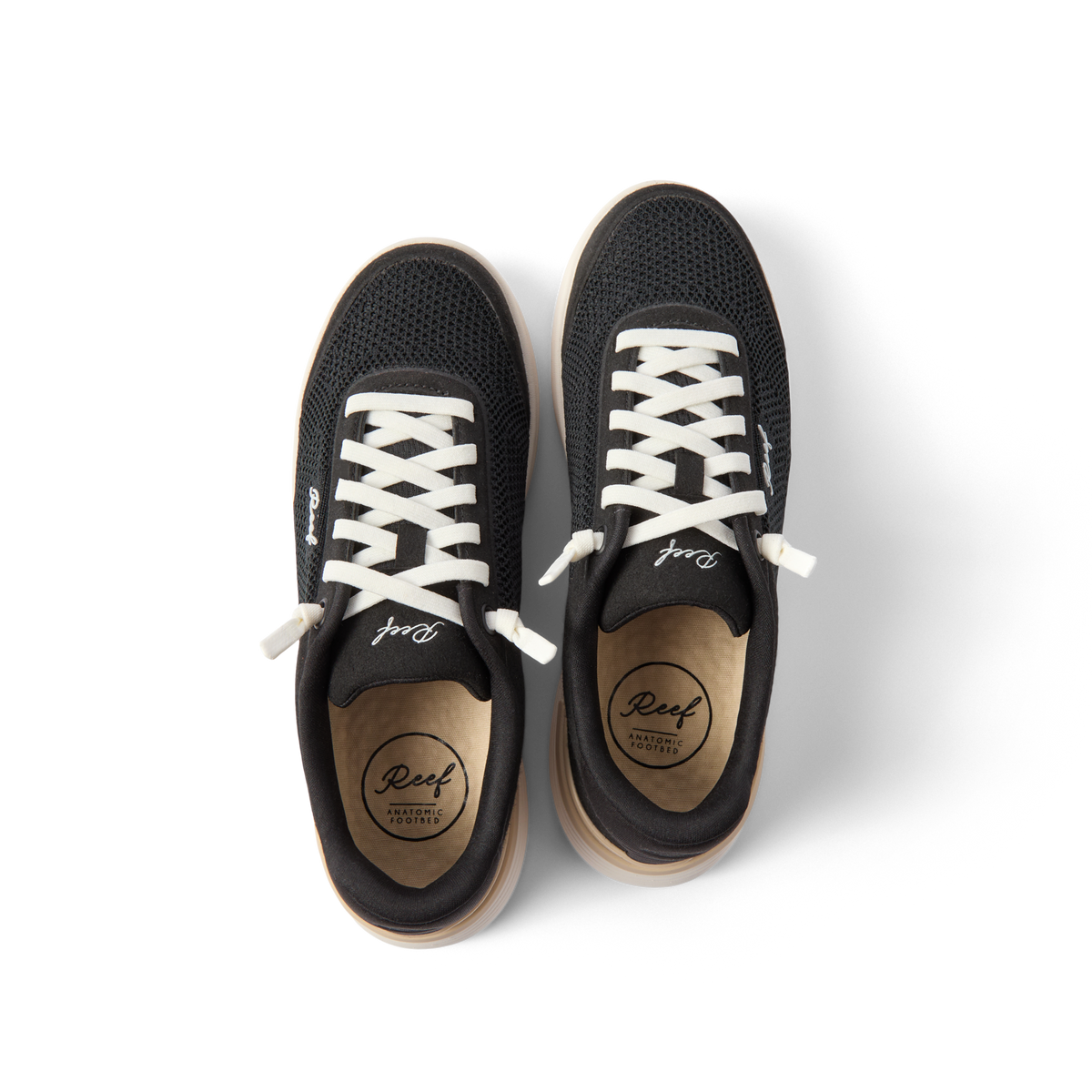 Top view of black Shoreline Palisades sneakers for women with white laces, breathable mesh, and cushioned insoles facing upward.