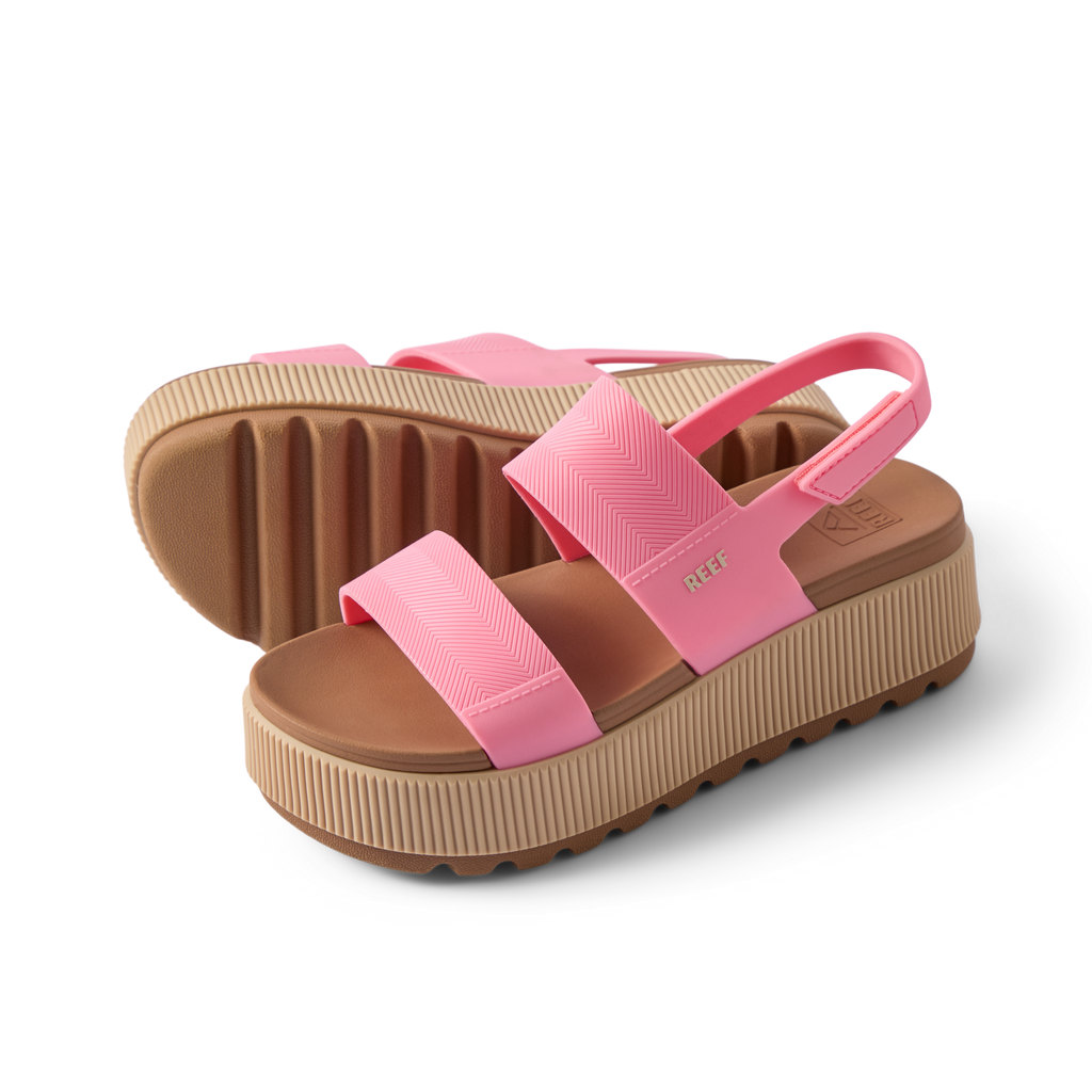 Water Vista Higher women's pink platform sandals facing left with comfort cushioning and arch support, beach-inspired design.