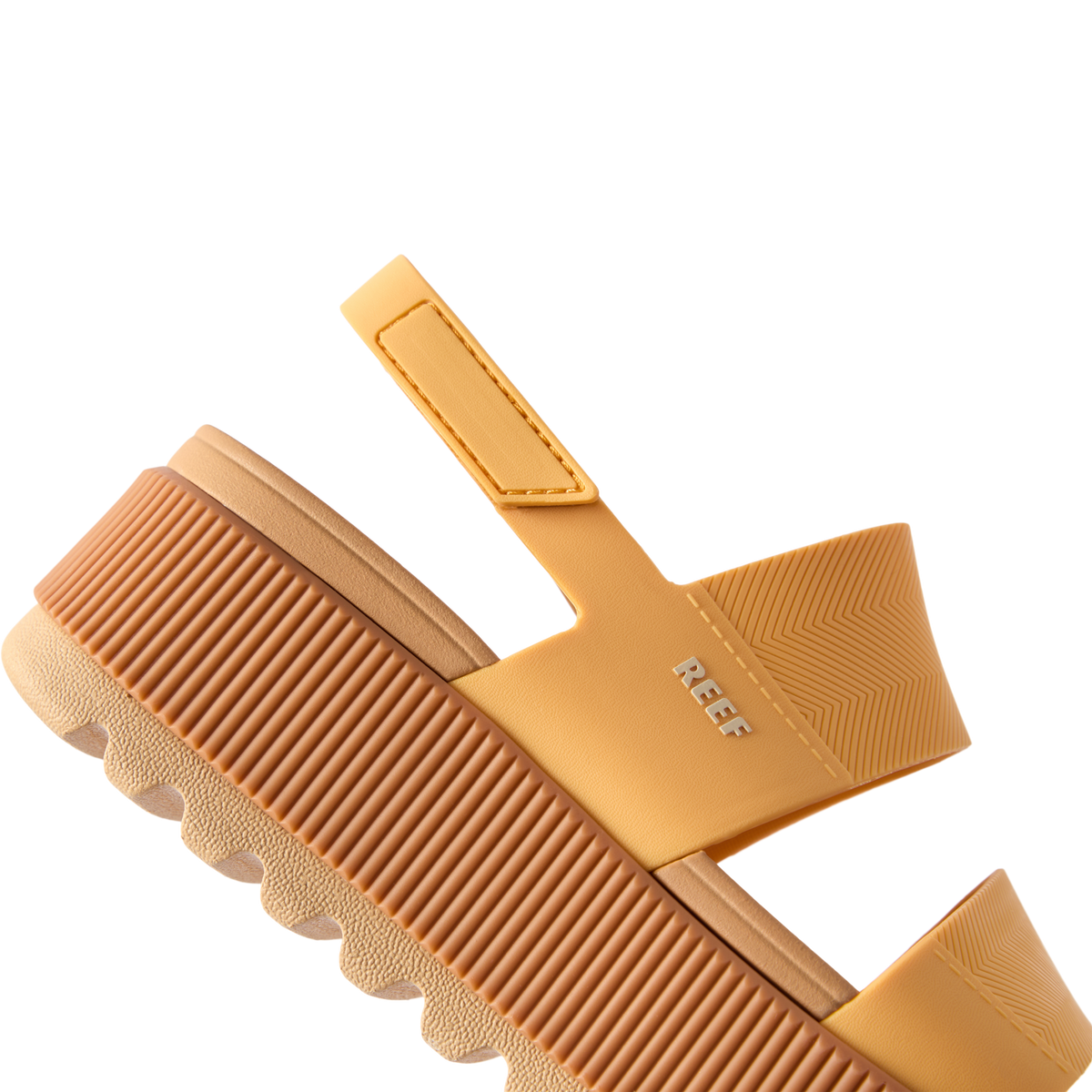 Side view of Water Vista Higher women's sandal in golden apricot with cushioned sole and anatomical arch support by REEF.