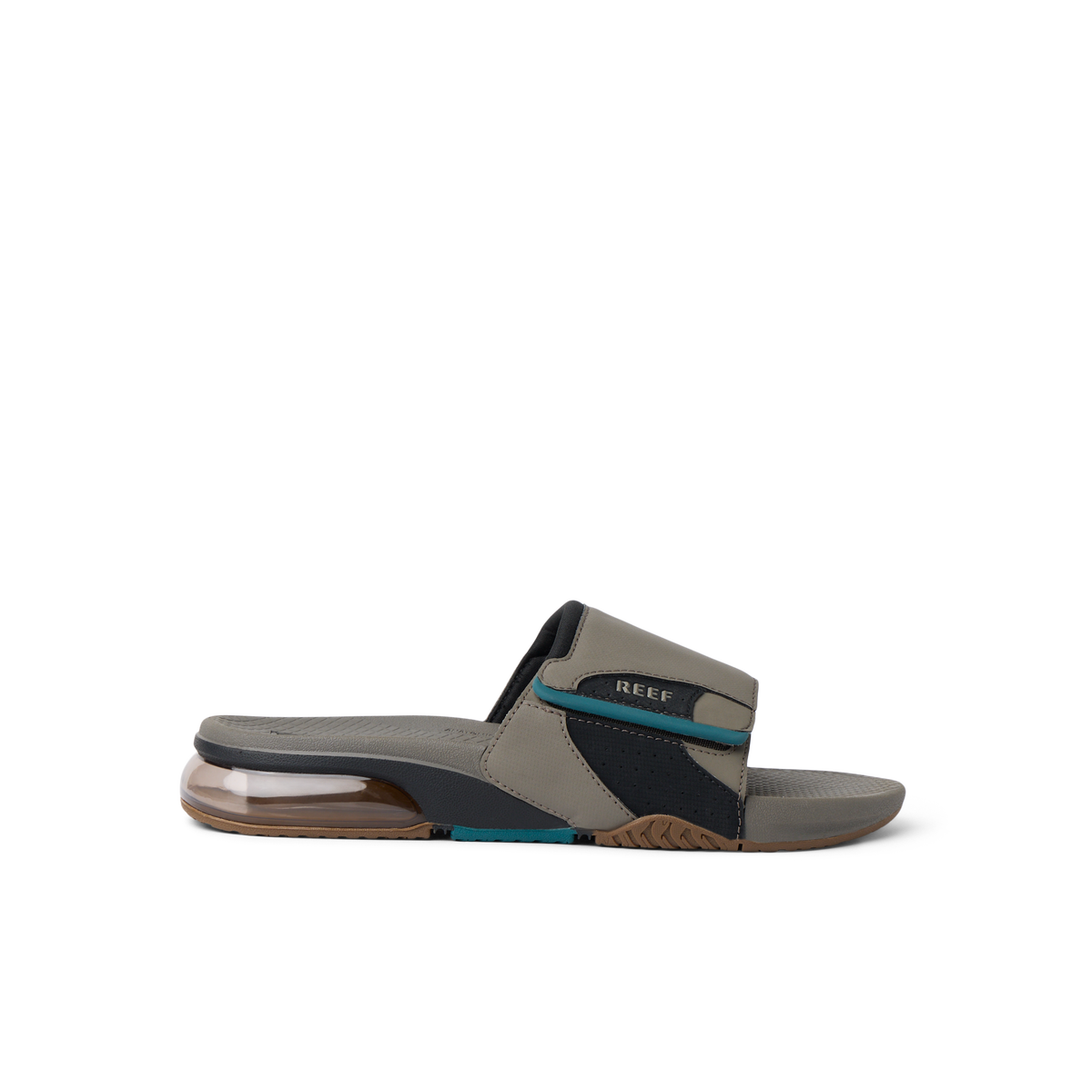 Fanning + Slide facing right, men's water-friendly sandal in tan and spruce with oversized airbag heel and REEFlex cushioning