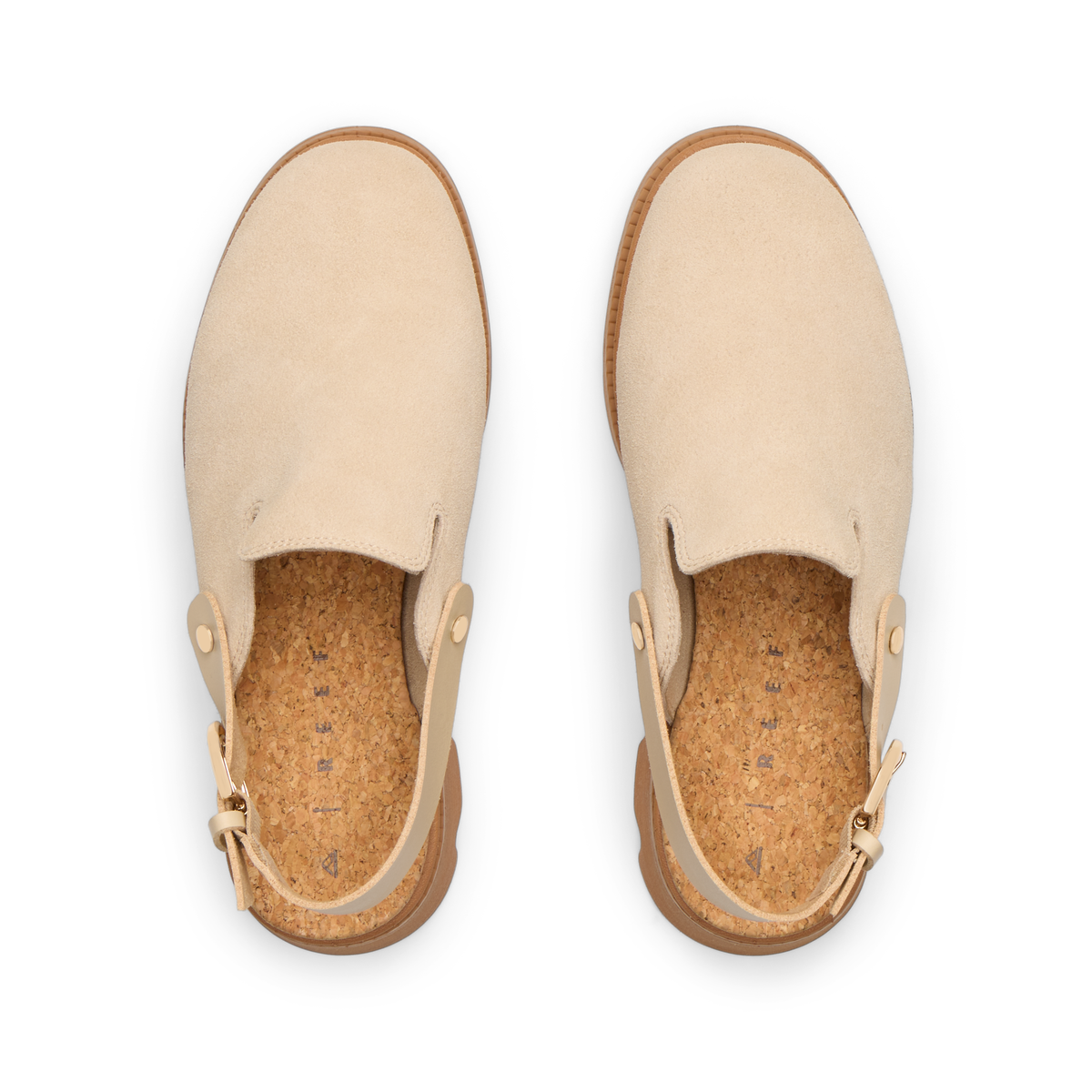 Vista Luxe Solene platform clogs facing upwards, showing soft suede upper and cork footbed for surf-inspired comfort.