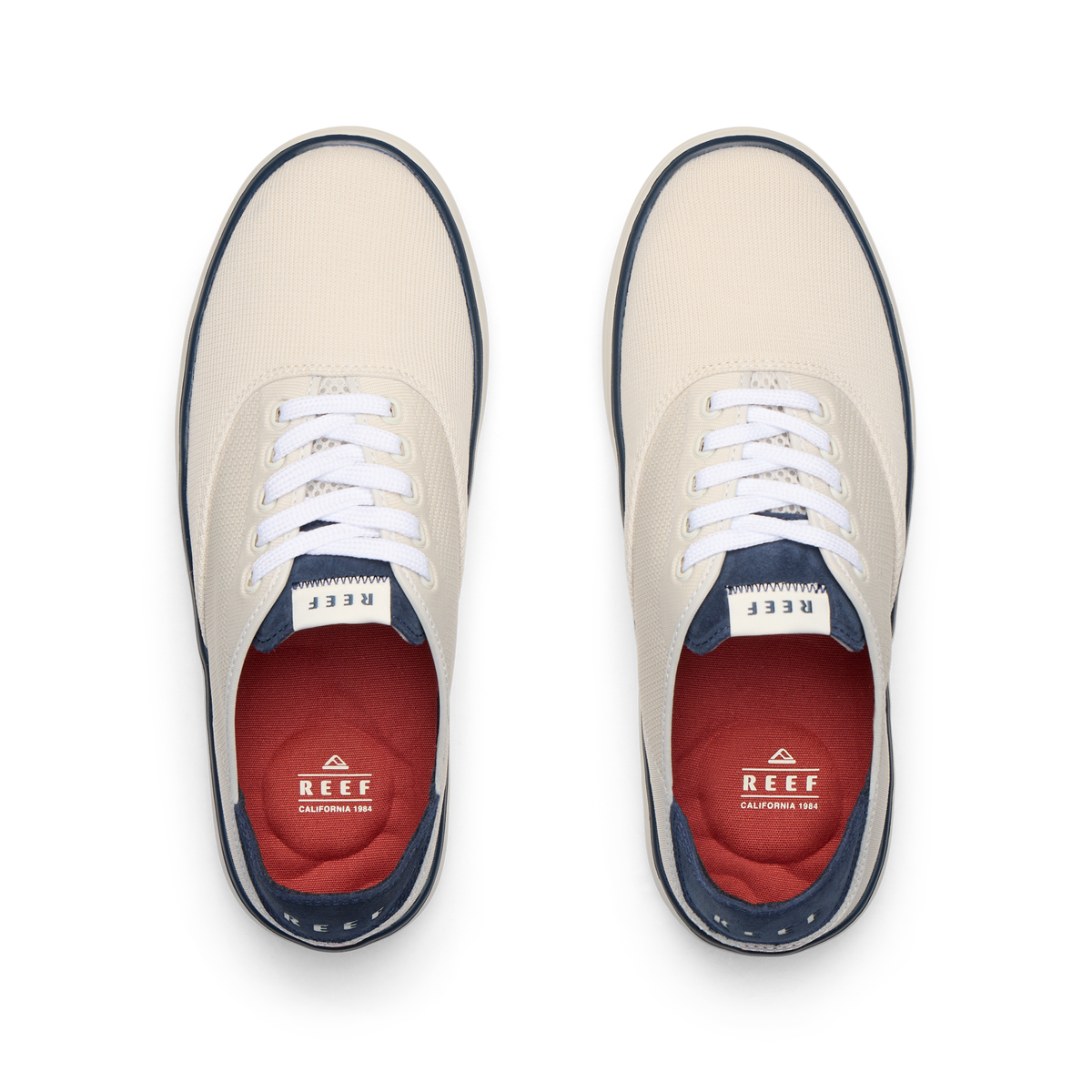 Top-down view of Neptune Lido men's shoes in tan and navy with Reef branding, featuring soft cushioning and arch support.