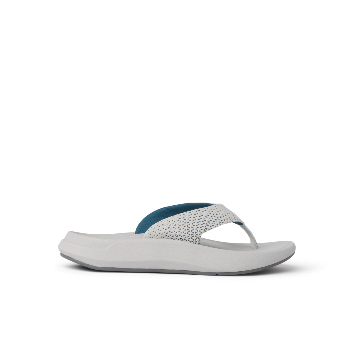 Side view of Rover + white and blue sandal with anatomical arch support and soft cushioning for beach comfort