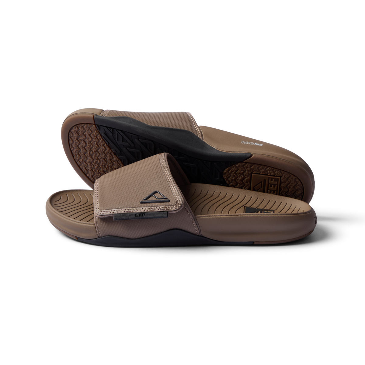 Phantom Slab men’s sandals in fossil black facing right showing footbed and top strap close-up, beach-inspired comfort footwear.