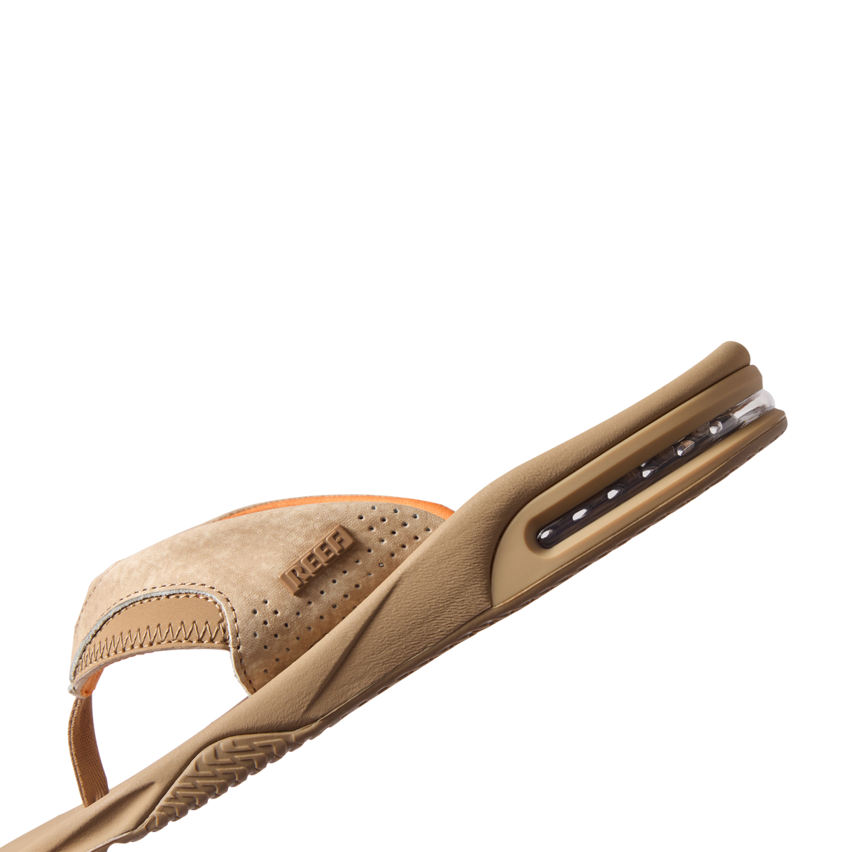 Fanning sandal in tan facing left, close-up of heel with anatomical arch support and soft-rebound cushioning