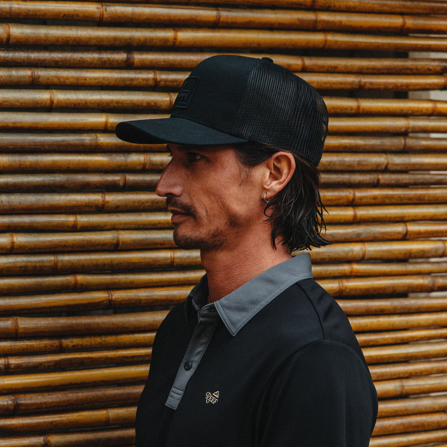 Side view of a man wearing the Tonal Townsend Hat, showcasing its surf-inspired, comfortable design for men.