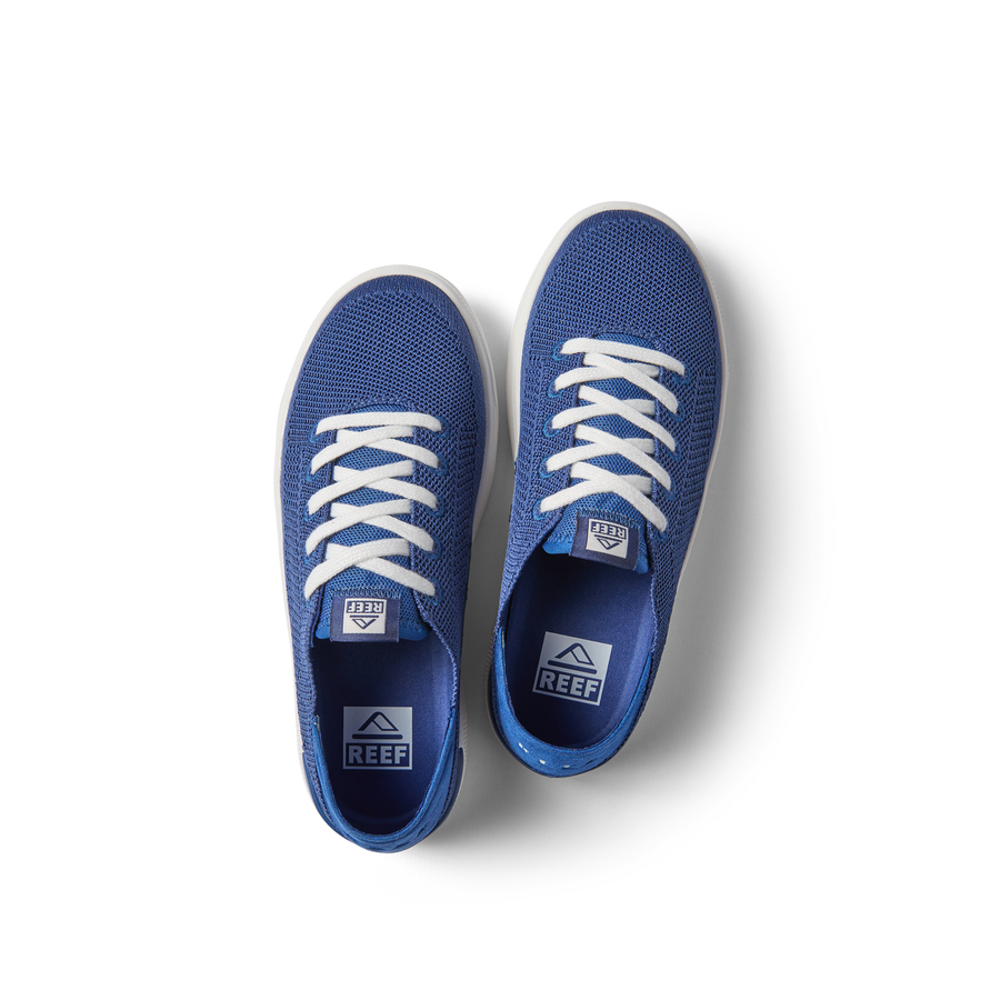 Top view of Kids Neptune navy sneakers with white laces, featuring lightweight, cushioned design for beach-inspired comfort.