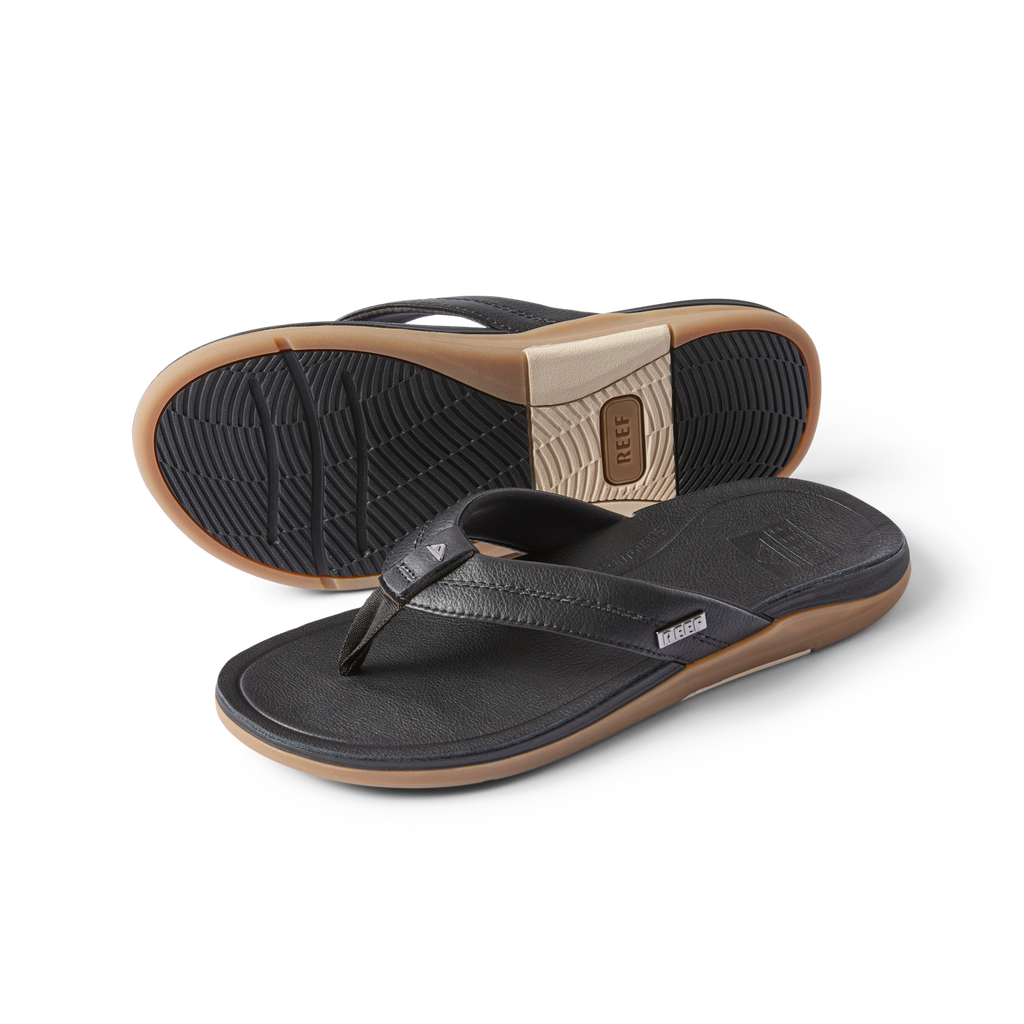 Leather Offshore men's black sandal showing top and bottom views, highlighting comfort and durable design facing right.