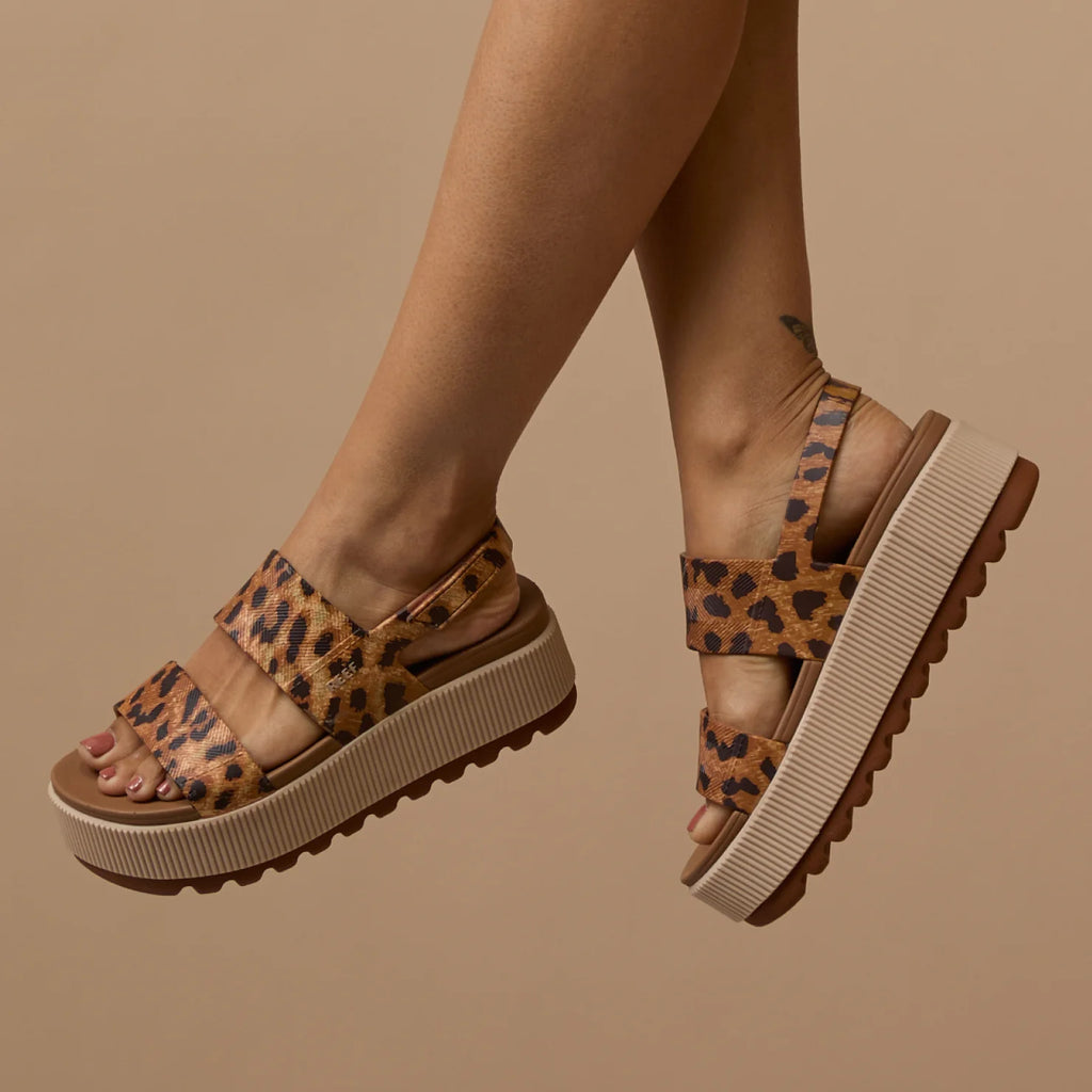 Side view of Women's Water Vista Higher sandals in leopard print with cushioned platform and anatomical arch support