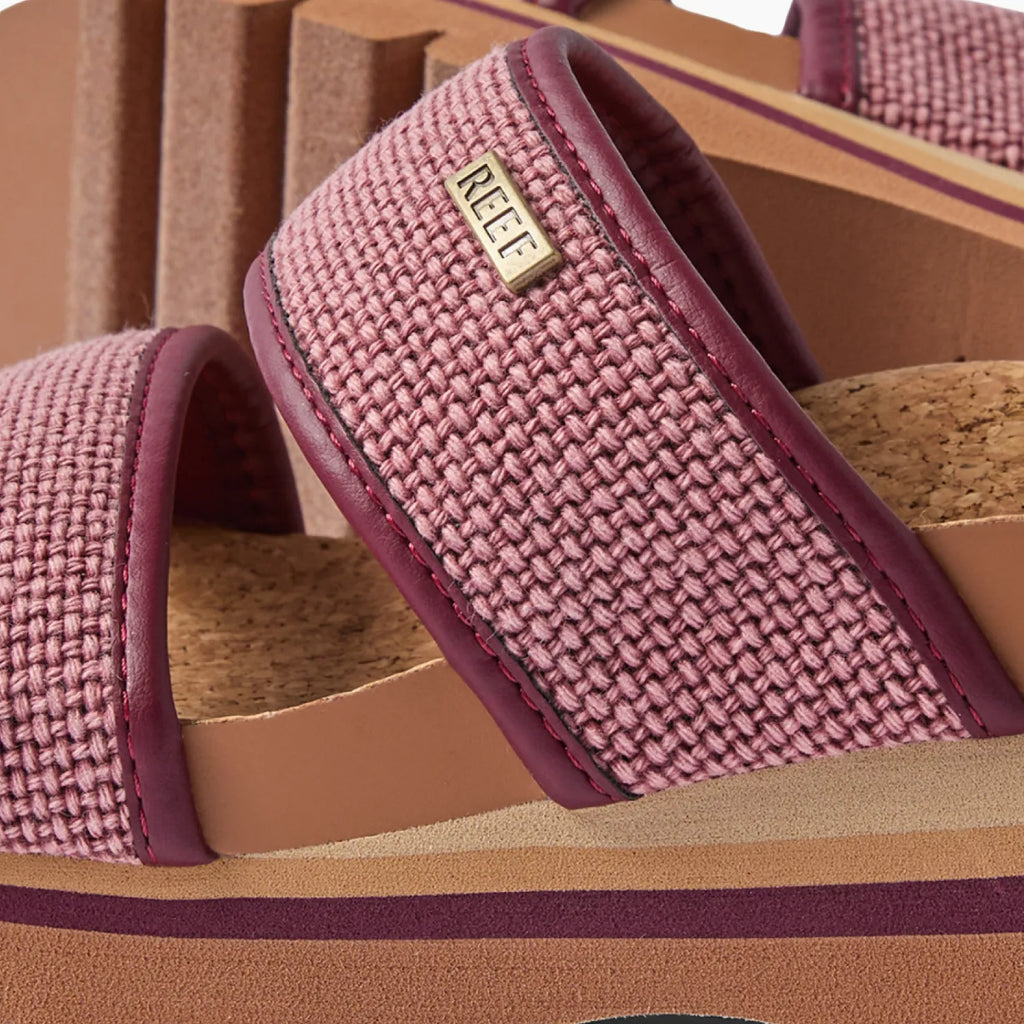 Close-up of the left side of Cushion Vista Higher sandal in burgundy canvas with anatomical arch support and cork footbed.