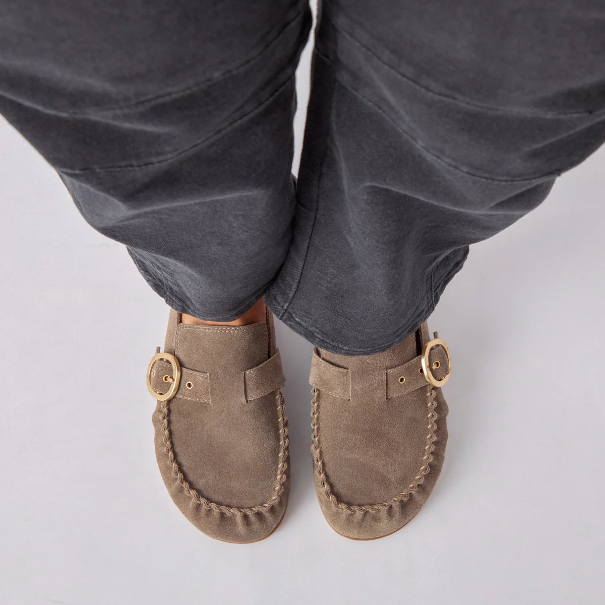Top-down view of Vista Siena slip-on clogs in driftwood suede with buckle detail, showcasing roomy silhouette and cushioned comfort