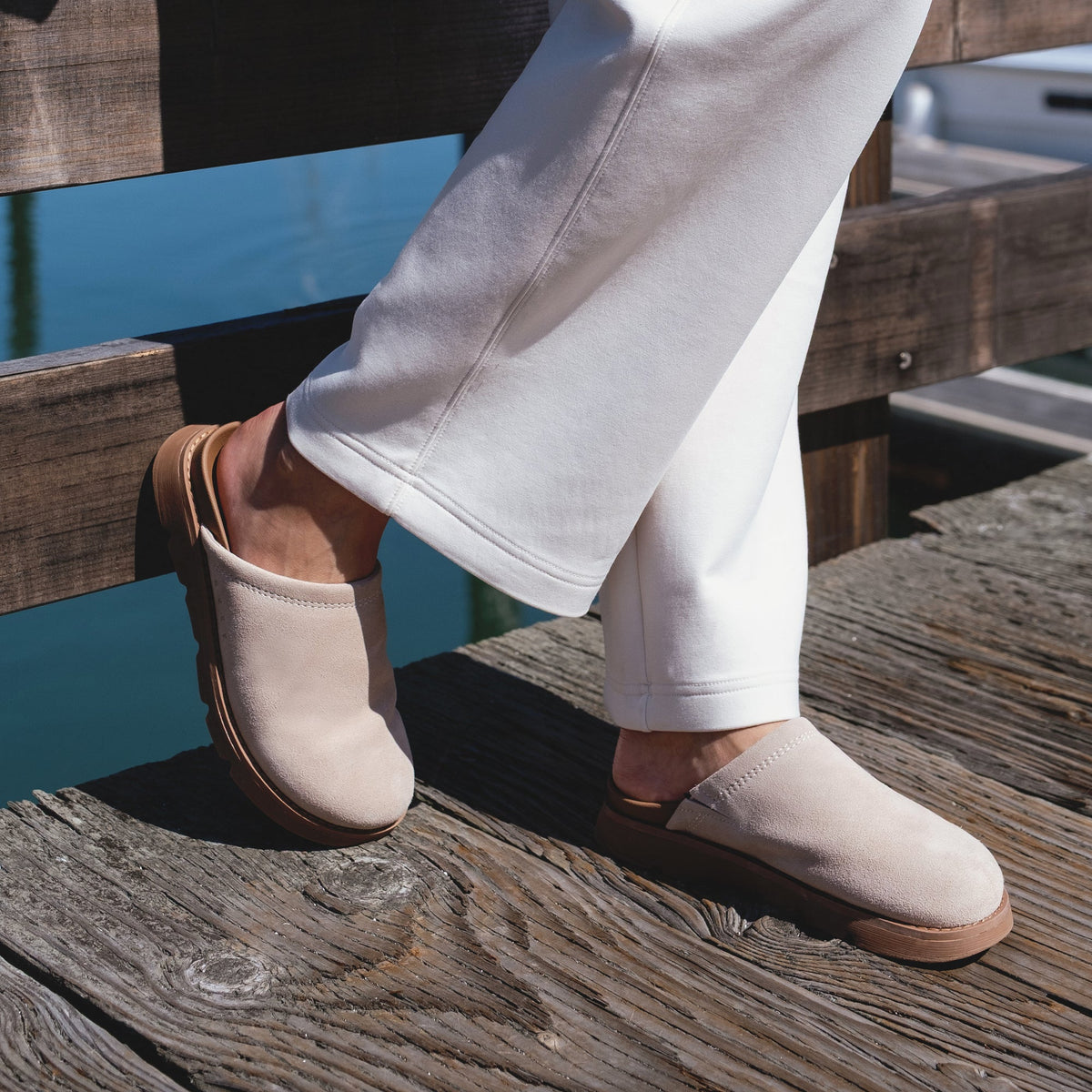 Vista Luxe Mariana facing left, women's light taupe suede clog with closed toe, cushioned arch support, and beach-inspired comfort