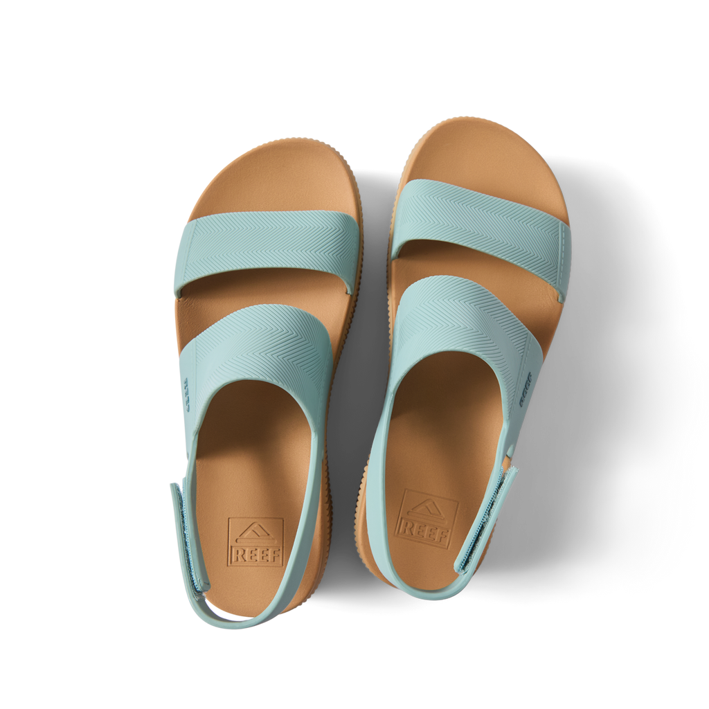 Water Vista Higher sandals for women, top view facing up, blue haze straps with tan cushioned footbed for comfort.