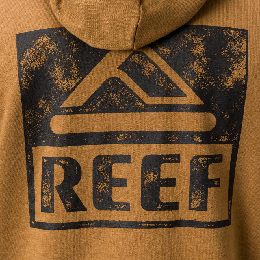Close-up of back of Wellie Too Hoodie in brown, showing REEF logo with surf-inspired comfort and durable design.